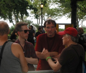 The Feelies' Glenn Mercer and Dave Weckerman talk to a fan in Battery Park.
